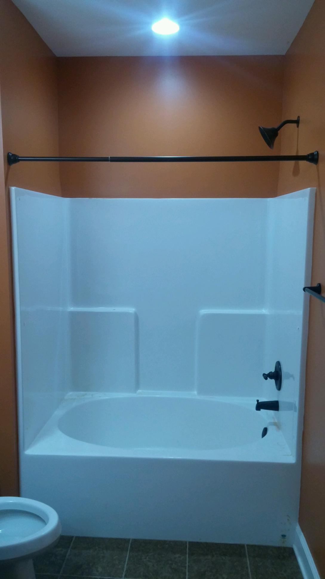 After and Before Make your shower bigger! The Shower Pros